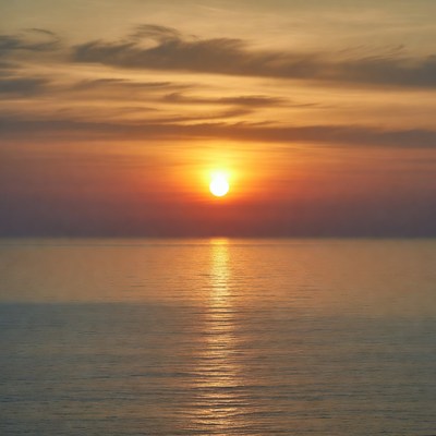 Sunset over calm ocean