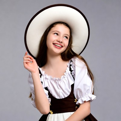 Girl in Bavarian Dirndl with Wide Hat
