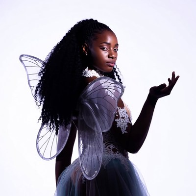 African-American woman with fairy wings