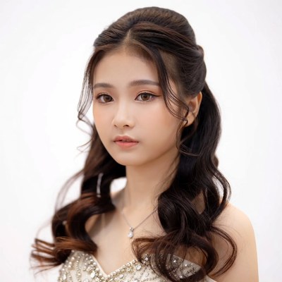 Asian woman with half-up hairstyle