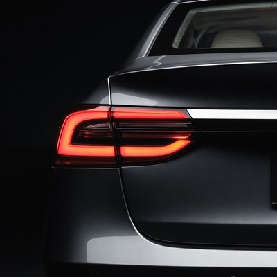 Tesla Rear Lights Glowing Dark Background