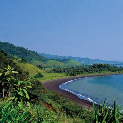 Black Sand Beach with Green Hills