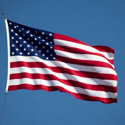 American flag waving in sky