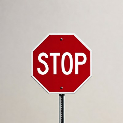 Red Stop Sign on Pole