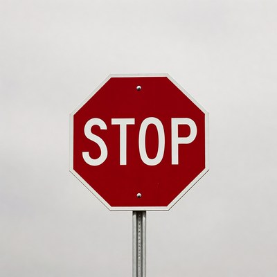 Red Stop Sign on Pole