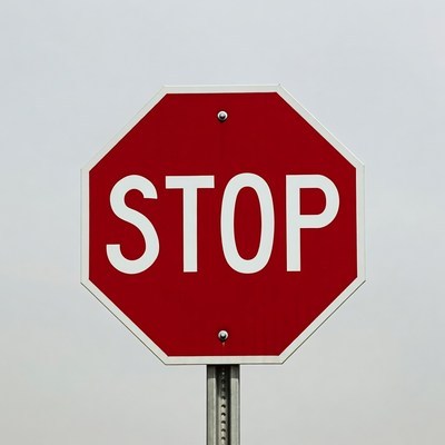 Red Stop Sign on Pole