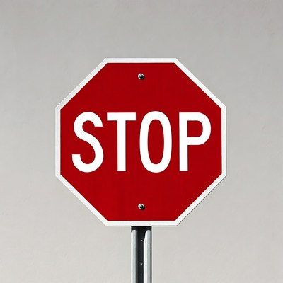 Red Stop Sign on Pole