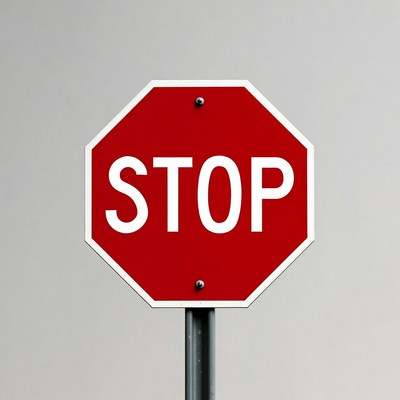 Red Stop Sign on Pole