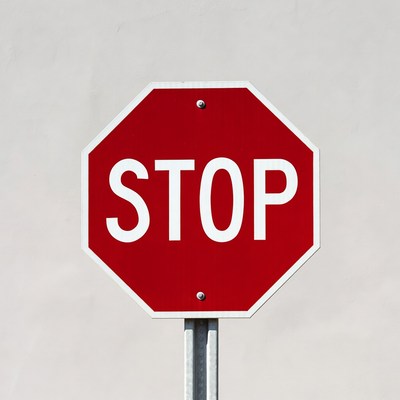 Red Stop Sign on Pole