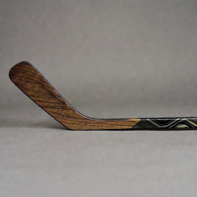 Wooden hockey stick isolated