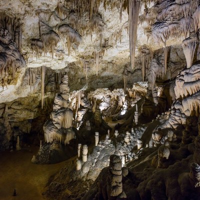 Stalactites in illuminated cave