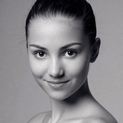 Smiling woman with bun hairstyle