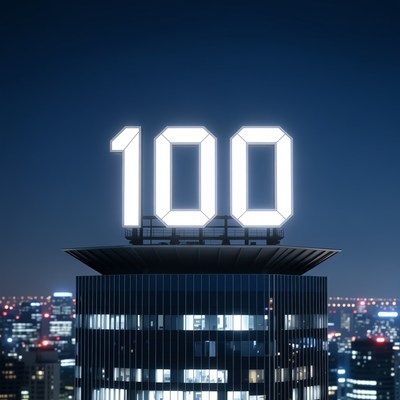 100 Sign on Skyscraper at Night