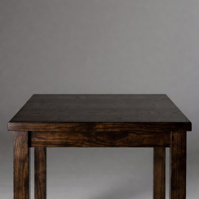 Wooden table on gray background