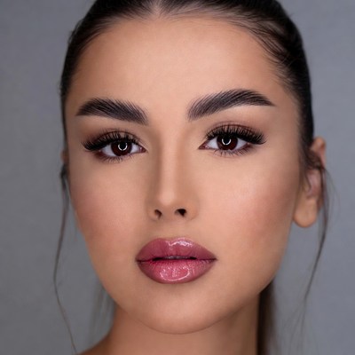 Woman with glossy lips close-up