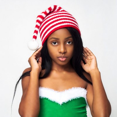 African-American woman in Santa hat