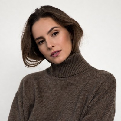 Woman in brown turtleneck sweater