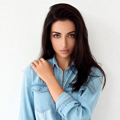 Beautiful woman in blue denim shirt