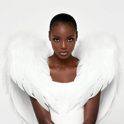 African-American woman with white angel wings