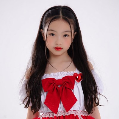 Asian girl in red bow dress