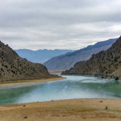 River flowing through rocky mountain valley