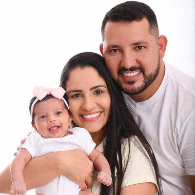 Family holding newborn baby