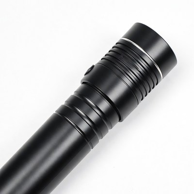Black tactical flashlight isolated