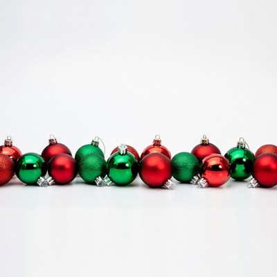 Red and Green Christmas Ornaments on White