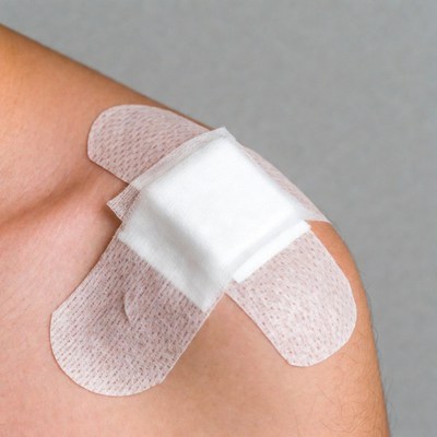 Bandage on man's shoulder