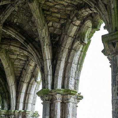Gothic stone arches in ruins