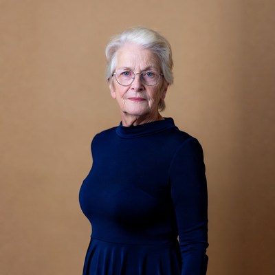 Elderly woman in navy dress