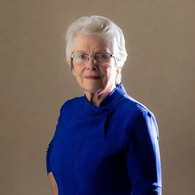 Elderly woman in blue dress
