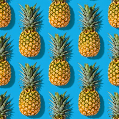 Pineapple Pattern on Blue Background