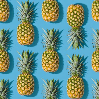 Pineapple Pattern on Blue Background