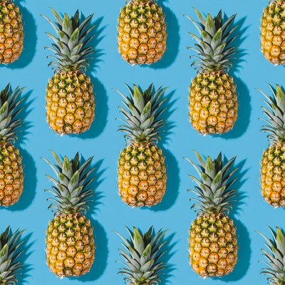 Pineapple Pattern on Blue Background