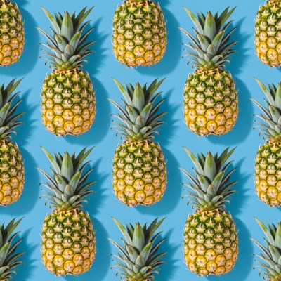 Pineapple Pattern on Blue Background