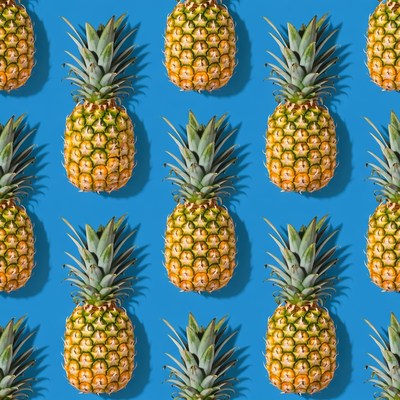 Pineapple Pattern on Blue Background
