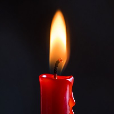 Red Burning Candle Flame