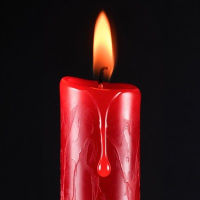 Red Burning Candle with Wax Dripping