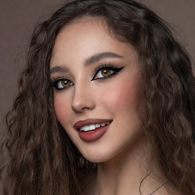 Beautiful woman with curly hair smiling