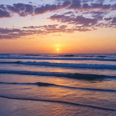 Sunset over ocean waves
