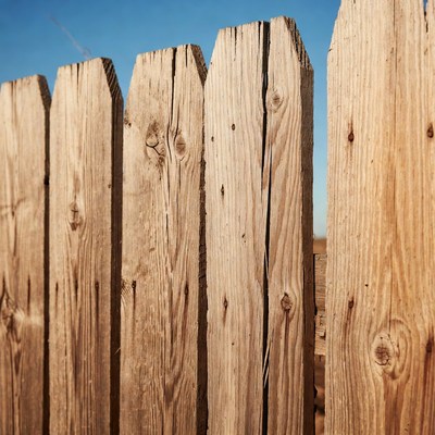 Weathered wooden picket fence