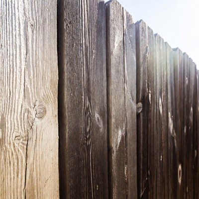 Weathered wooden fence planks