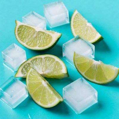 Fresh lime slices with ice cubes