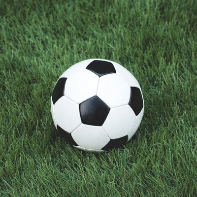 Soccer ball on green grass