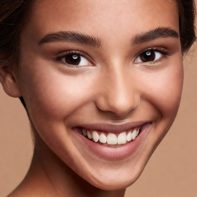Smiling mixed-race woman close-up