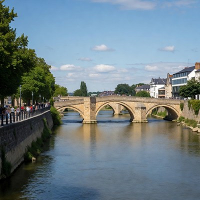 Stone Bridge Over River with Pedestrians