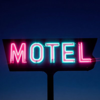 Glowing Motel Sign at Night