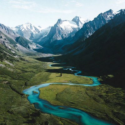 Turquoise River in Snowy Mountains