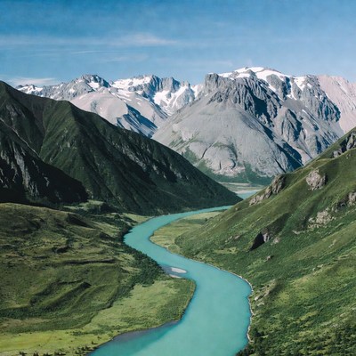 Turquoise River in Snowy Mountains